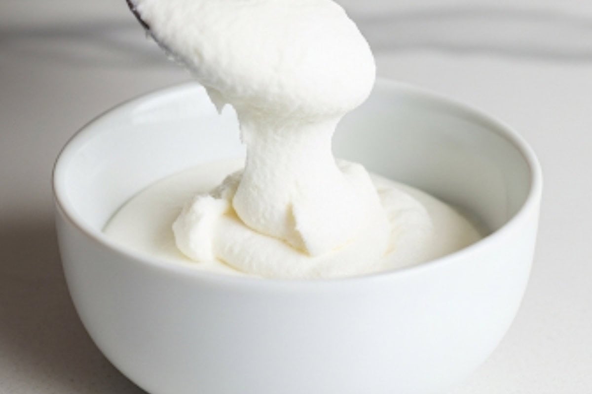 Refrigerate sealed cans of coconut cream overnight. Without shaking, open and scoop the thick cream into a bowl