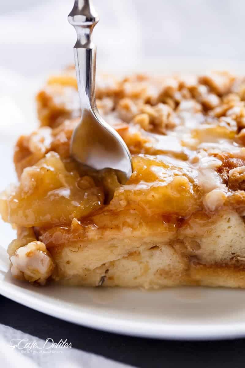 A spoon in Apple Pie French Toast Bake (Casserole)