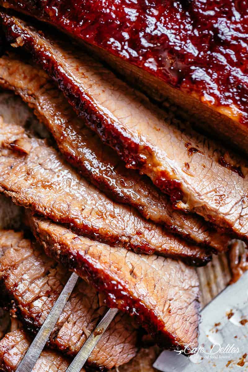 Juicy Beef Brisket slices cooked low and slow until tender, basted in a mouthwatering barbecue sauce with a kick of garlic