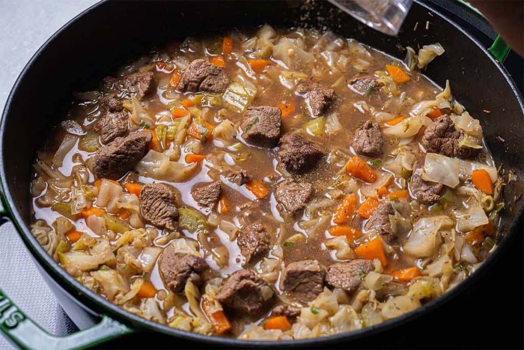 Cabbage Soup With Beef close up in a pot finished