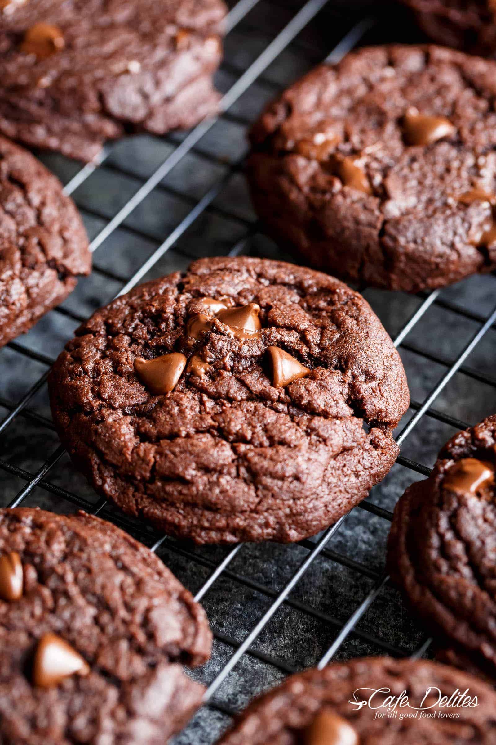 Cookies resting on a cooling rack.
