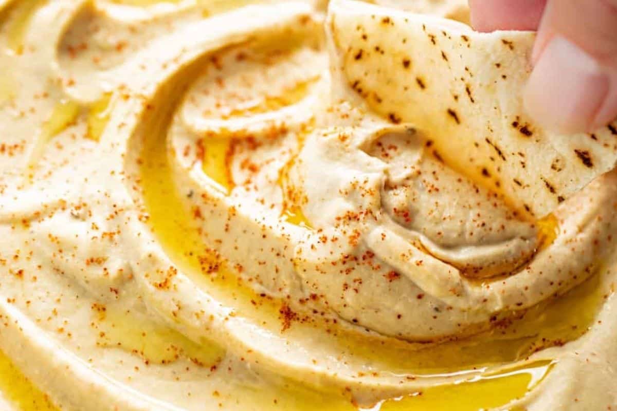 Taste and adjust flavors. Transfer to a bowl, drizzle with olive oil, and sprinkle with paprika