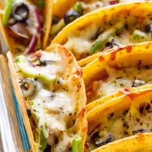 Oven Baked BBQ Chicken Pizza Tacos on a baking tray