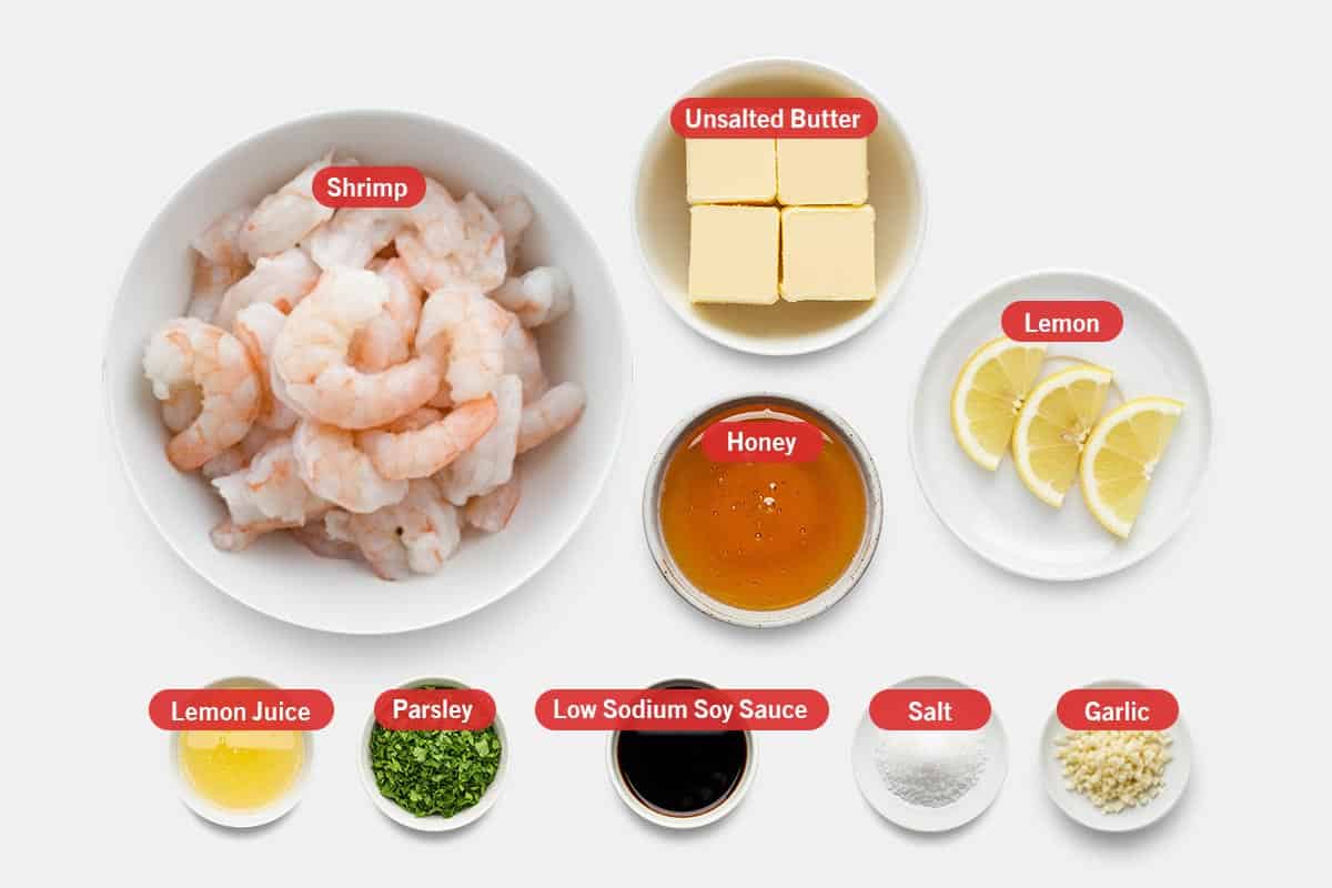 Top shot of ingredients: Shrimp. unsalted butter, honey, lemon, lemon juice, parsley, low sodium soy sauce, salt, and garlic.