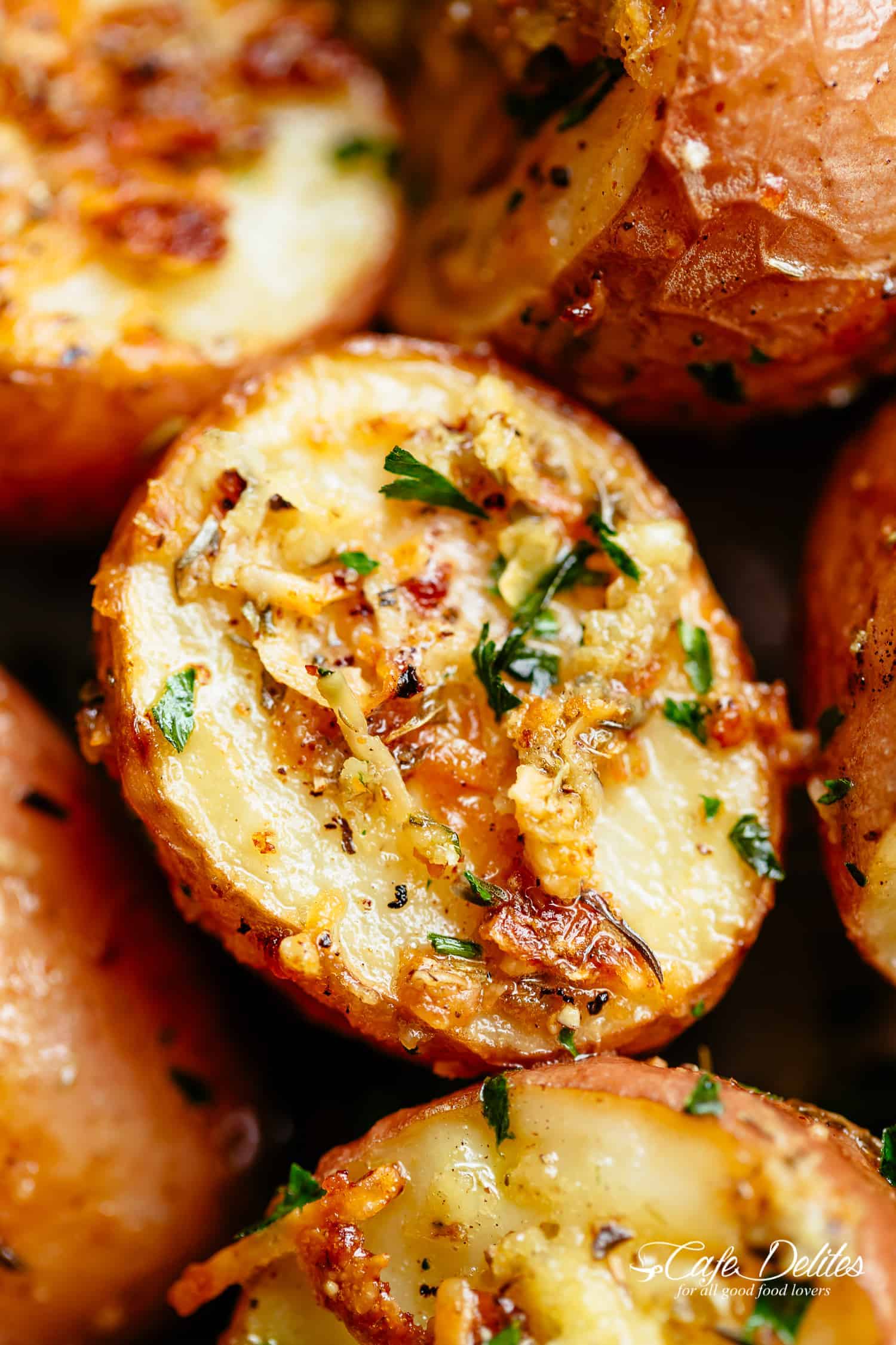 Herbs, garlic, and parmesan cheese are roasted together to make a reliable Crispy Browned Butter Parmesan Roasted Potatoes!