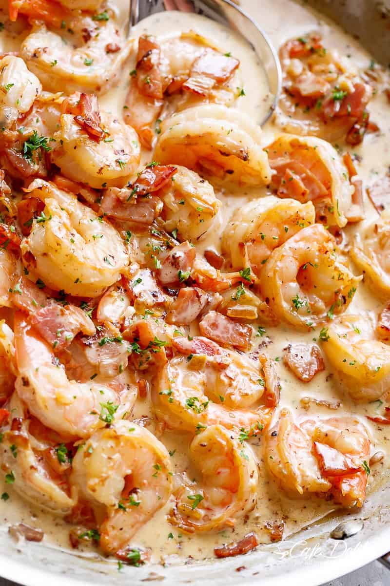Zoom in shot of Carbonara inspired Shrimp Alfredo with bacon