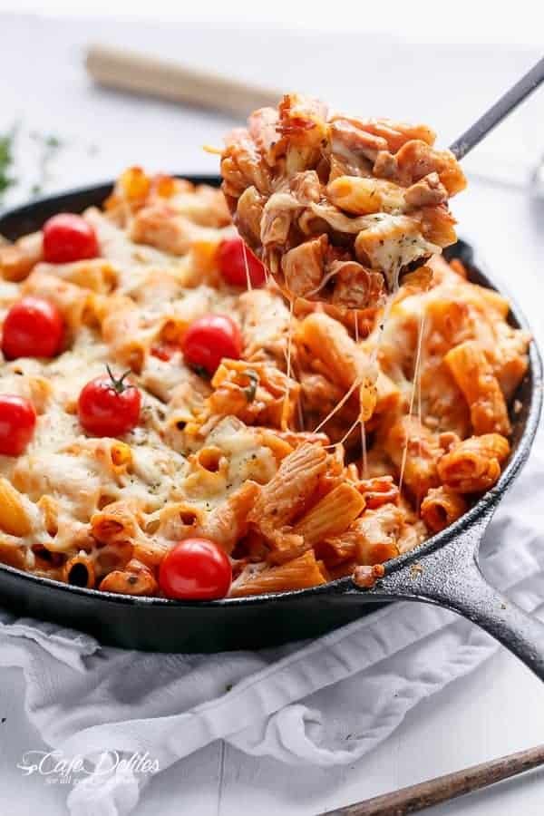 good Cheesy Chicken and Roasted Tomato Mozzarella Pasta Bake in a pan