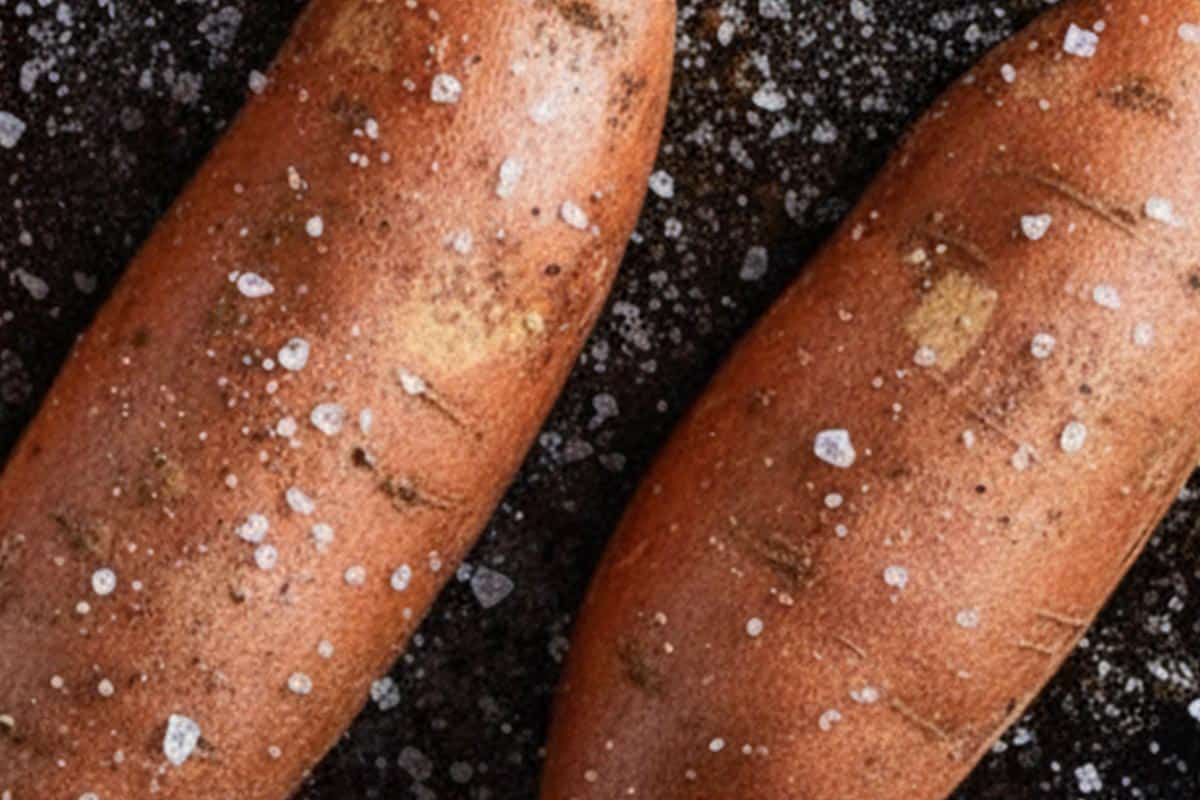 Arranged the sweet potatoes cut-side down on the baking sheet.