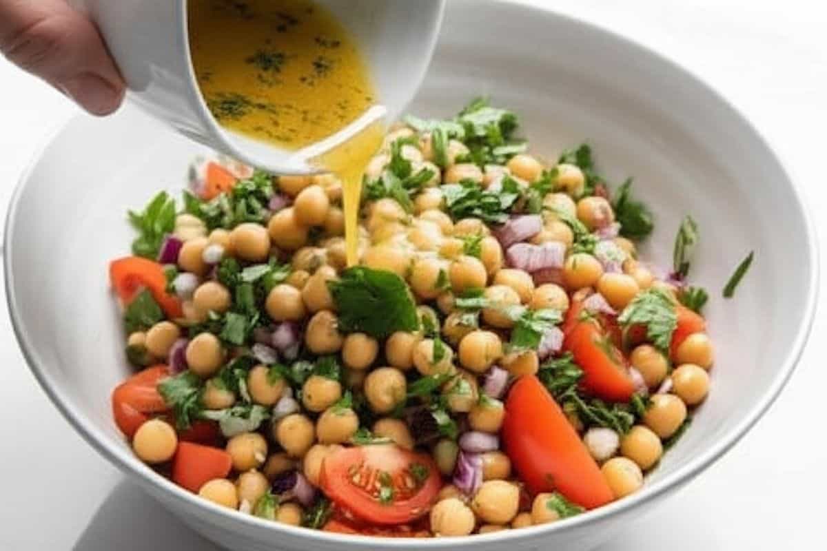 Pour the dressing over the chickpea mixture.