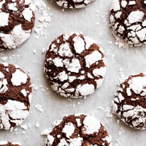 Fudgy Chocolate Crinkle Cookies have an irresistible brownie textured centre, with a crunch of cookie on the outside! One of our favourite Christmas cookies right here! ONLY 88 calories EACH!
