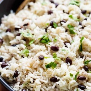 Black Beans & Rice is one of a reliable side recipes out there! Flavored with a squeeze of lime juice, garlic and spices, this rice recipe is a winner!