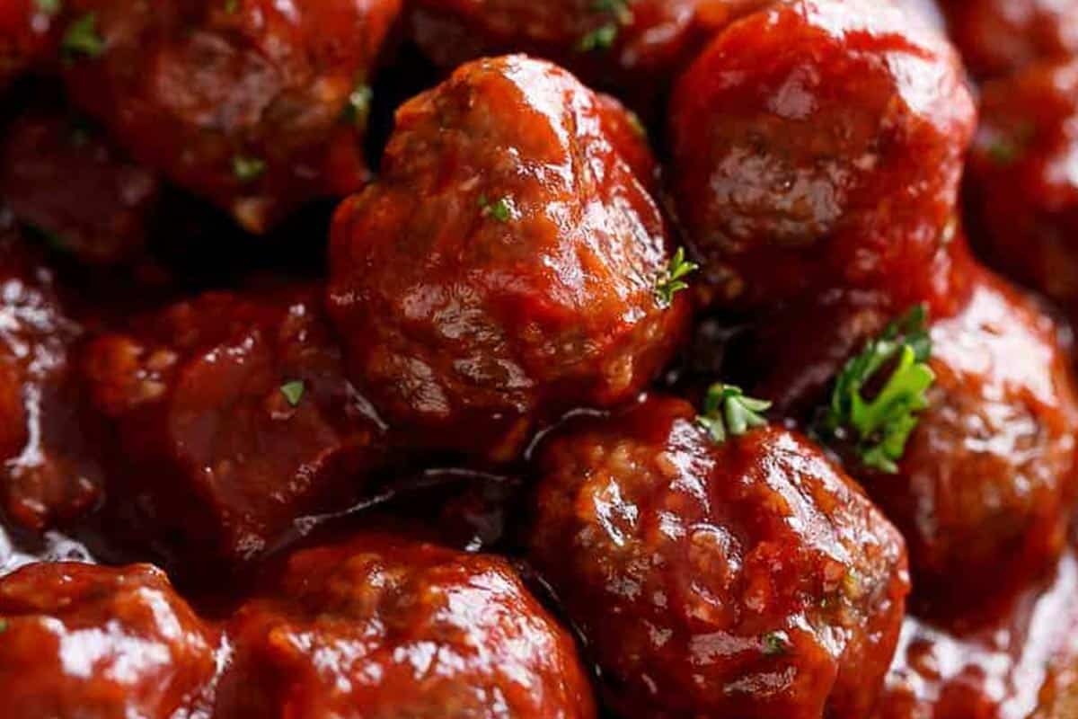 Close-up shot of Cocktail Meatballs (Sweet and Sour Sauce).