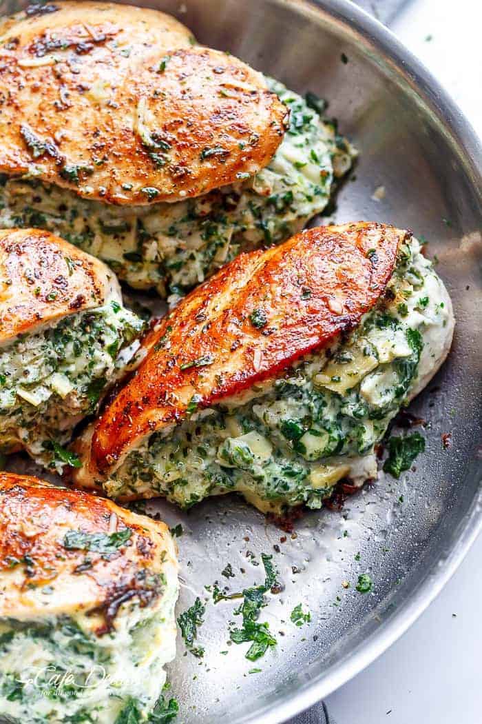 Spinach Artichoke Stuffed Chicken is a good way to turn a creamy dip into an good dinner! Serve it with a creamy sauce for added flavor!