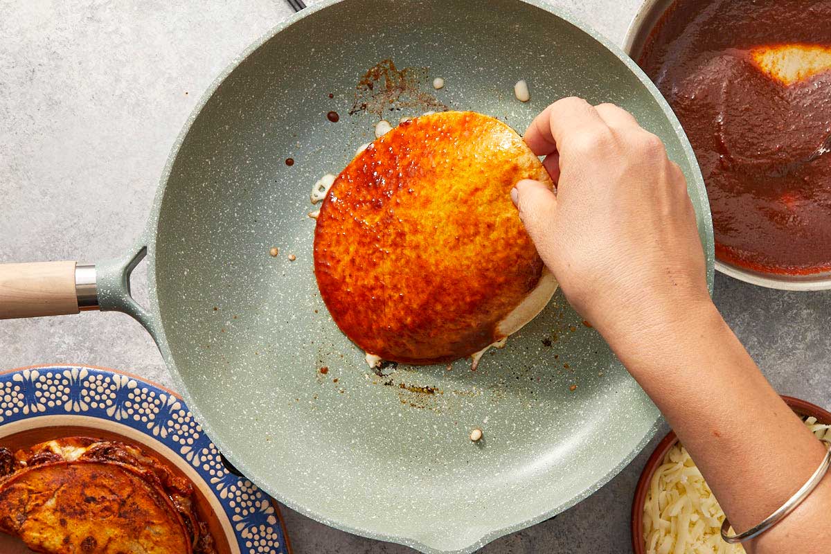 Tortilla being dipped and fried
