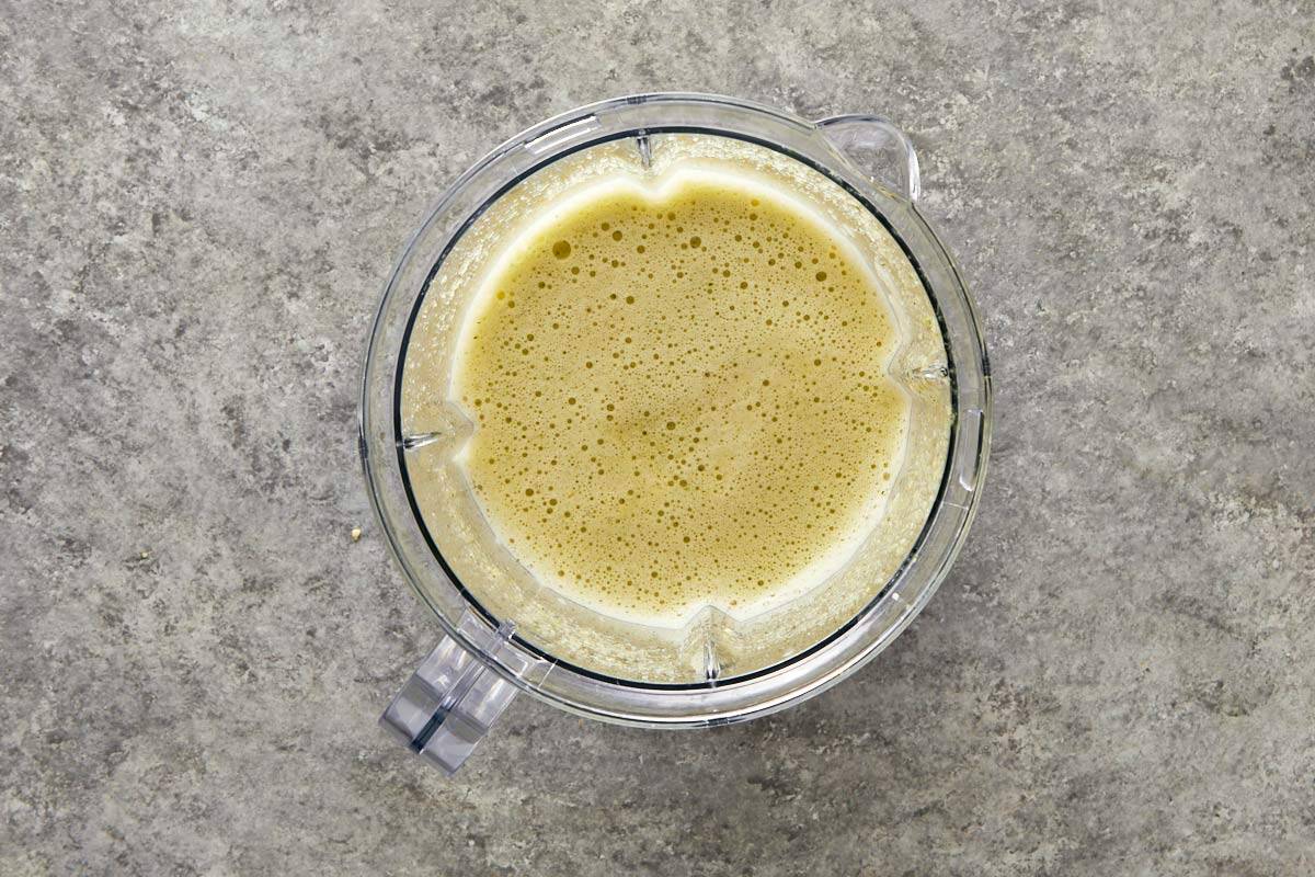 Smooth blended marinade mixture inside a blender jar.