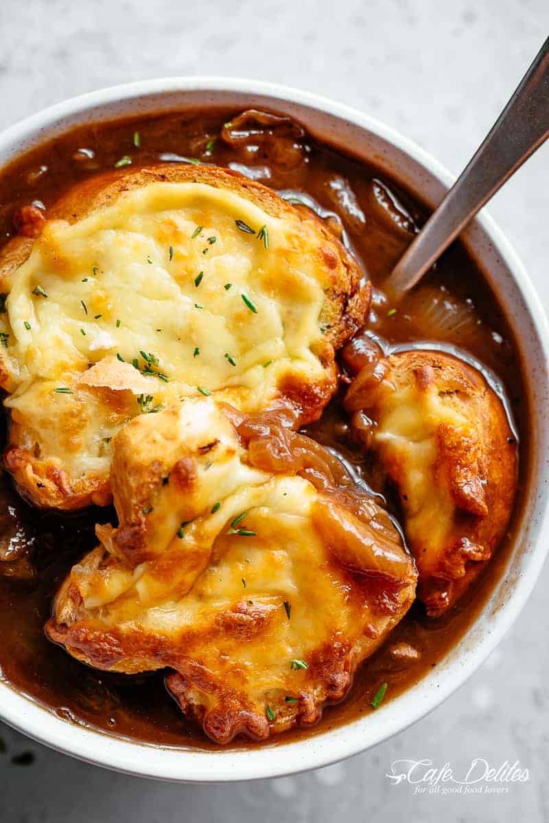 Classic French Onion Soup finished off with garlic bread and two types of melted cheese