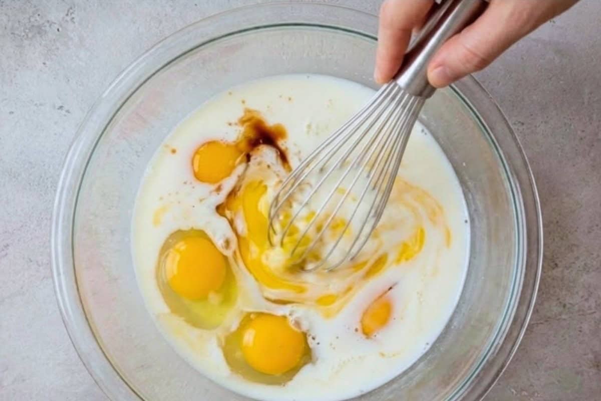 Beat together eggs, milk, and vanilla