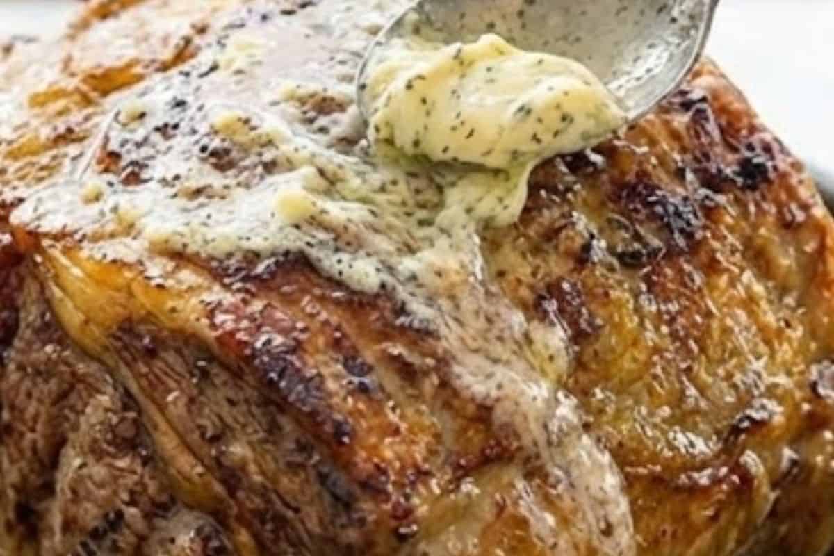 Carefully remove the roast, spread with the rest of the garlic butter