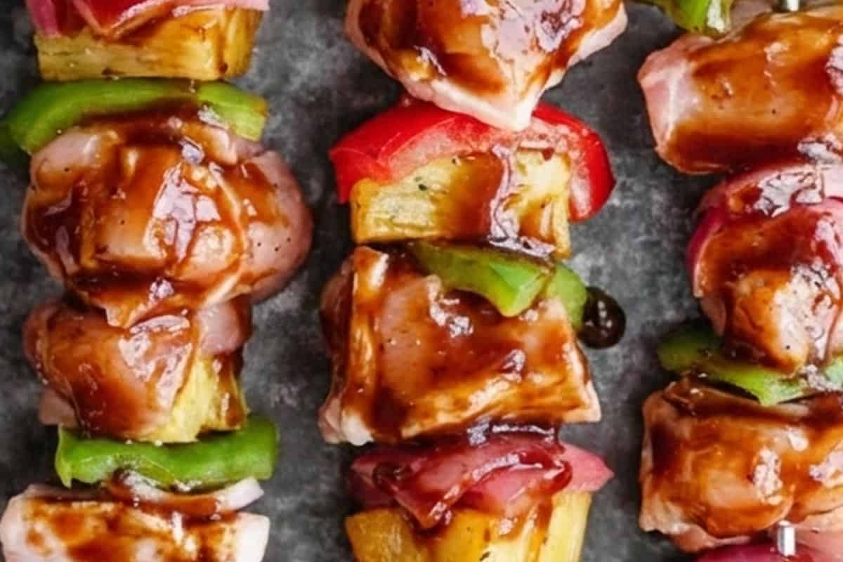 Brushed the skewers with sauce.