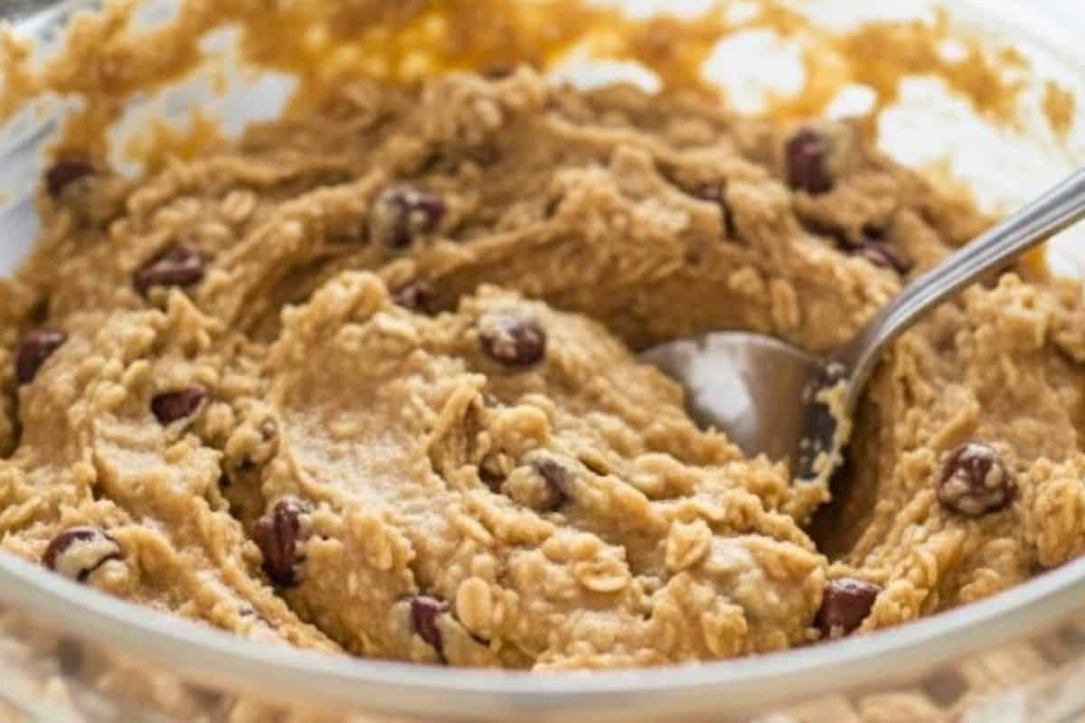 Fold in any extras, like peanut flour, chocolate chips, honey, or dried fruit, to customize your Breakfast Cookies.