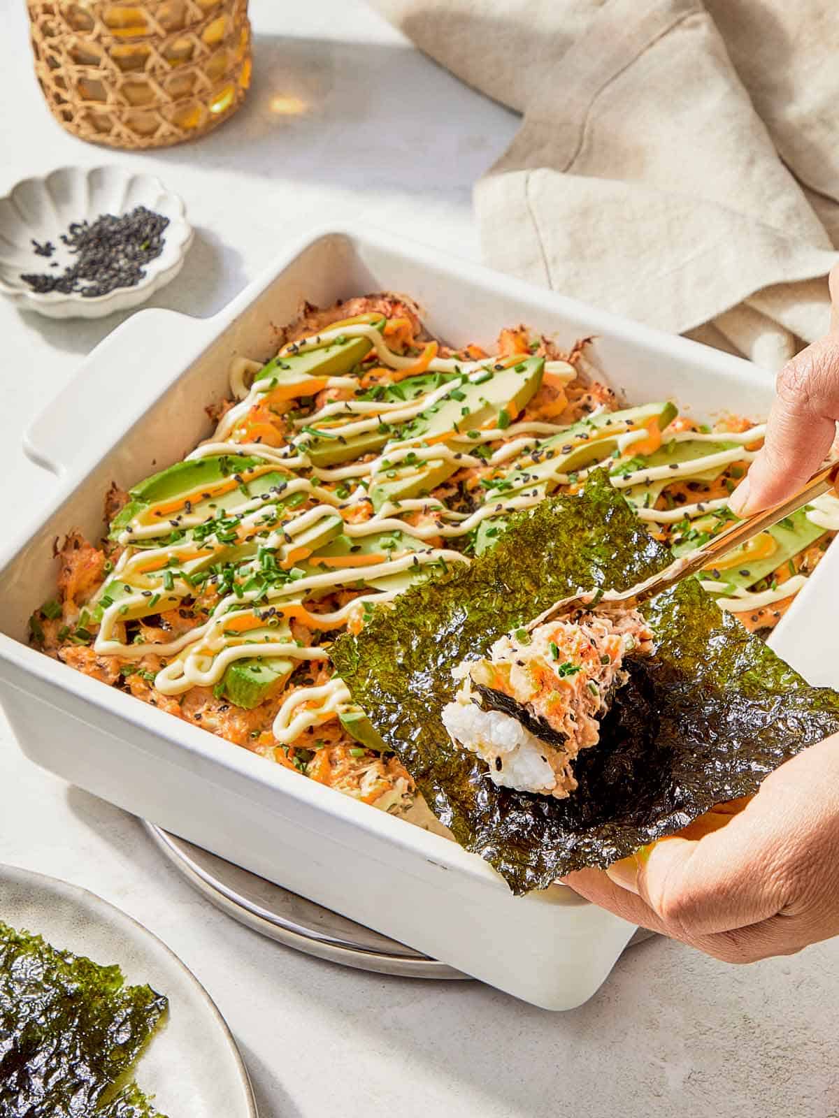 Sushi piece with seaweed, highlighting a good sushi bake dish.