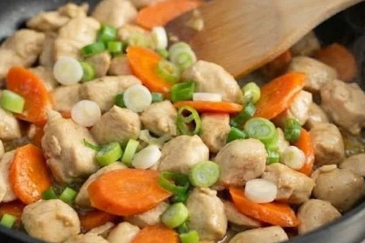 Add the chicken pieces and fry until they turn golden