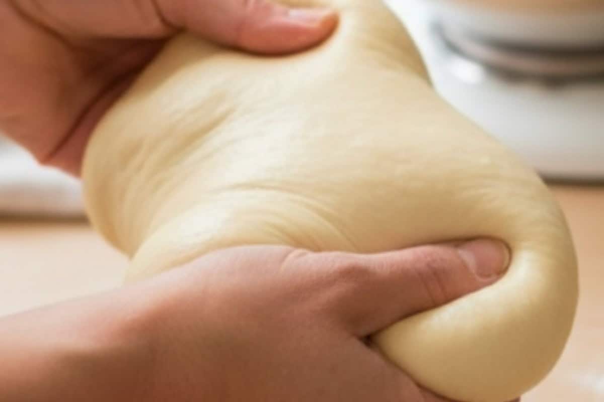he dough should be soft, stretchy, and smooth on top when pulled gently.