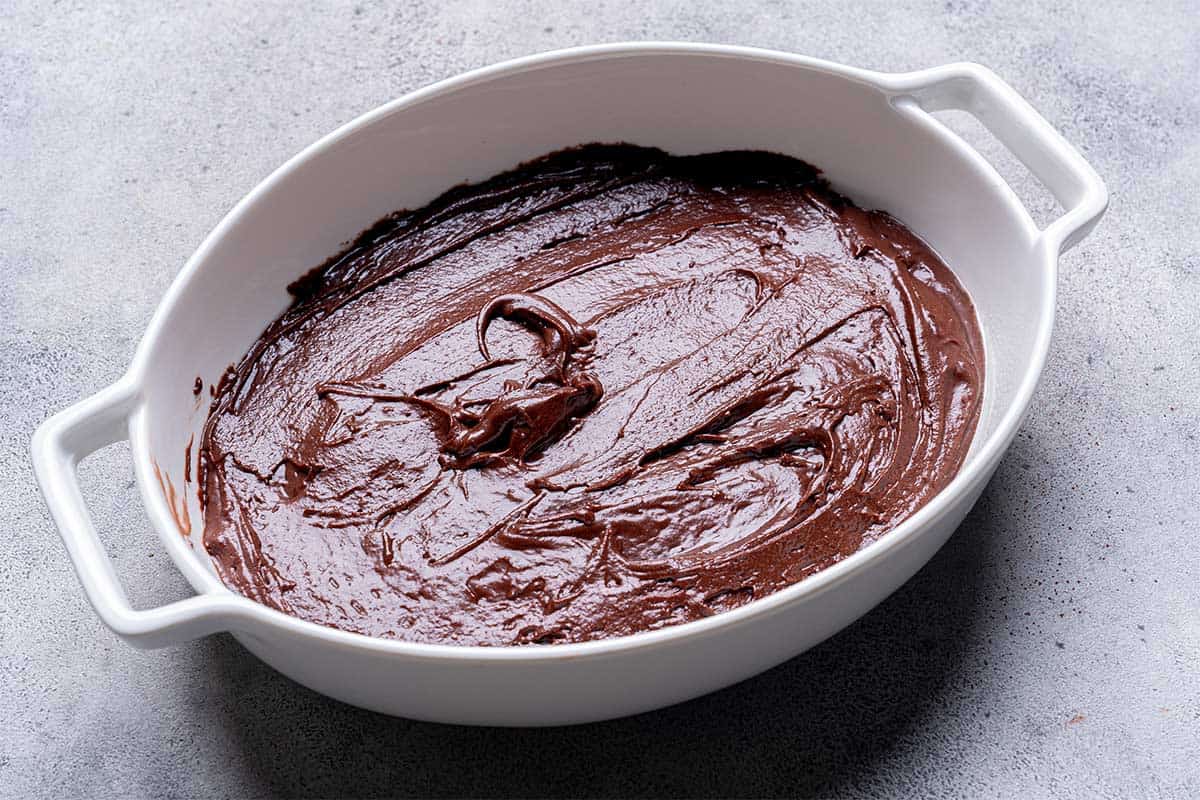 chocolate batter sitting in a pan