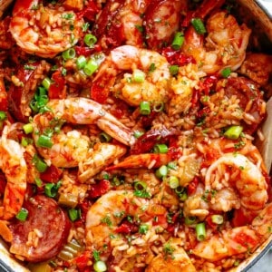 An authentic Creole Jambalaya recipe! A good one-pot meal coming to you from New Orleans is pure comfort food filled to the brim with chicken, shrimp, andouille sausage, rice, seasonings, spices and good flavours! Ready and on the table in 45 minutes!