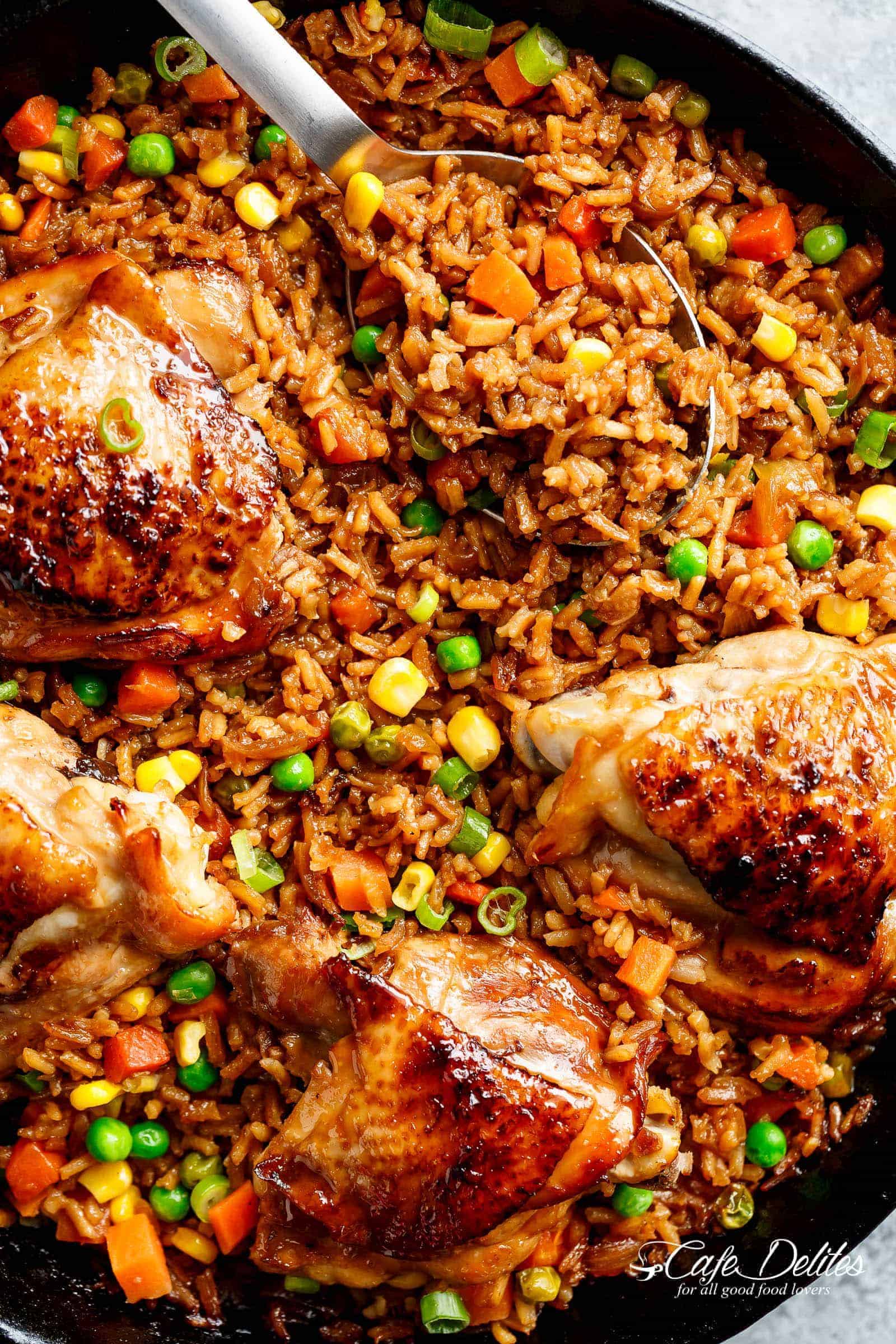 One Pan Asian Chicken and Rice equals crispy skinned chicken full of good Chinese-inspired flavours sits on top of a fried rice inspired skillet!