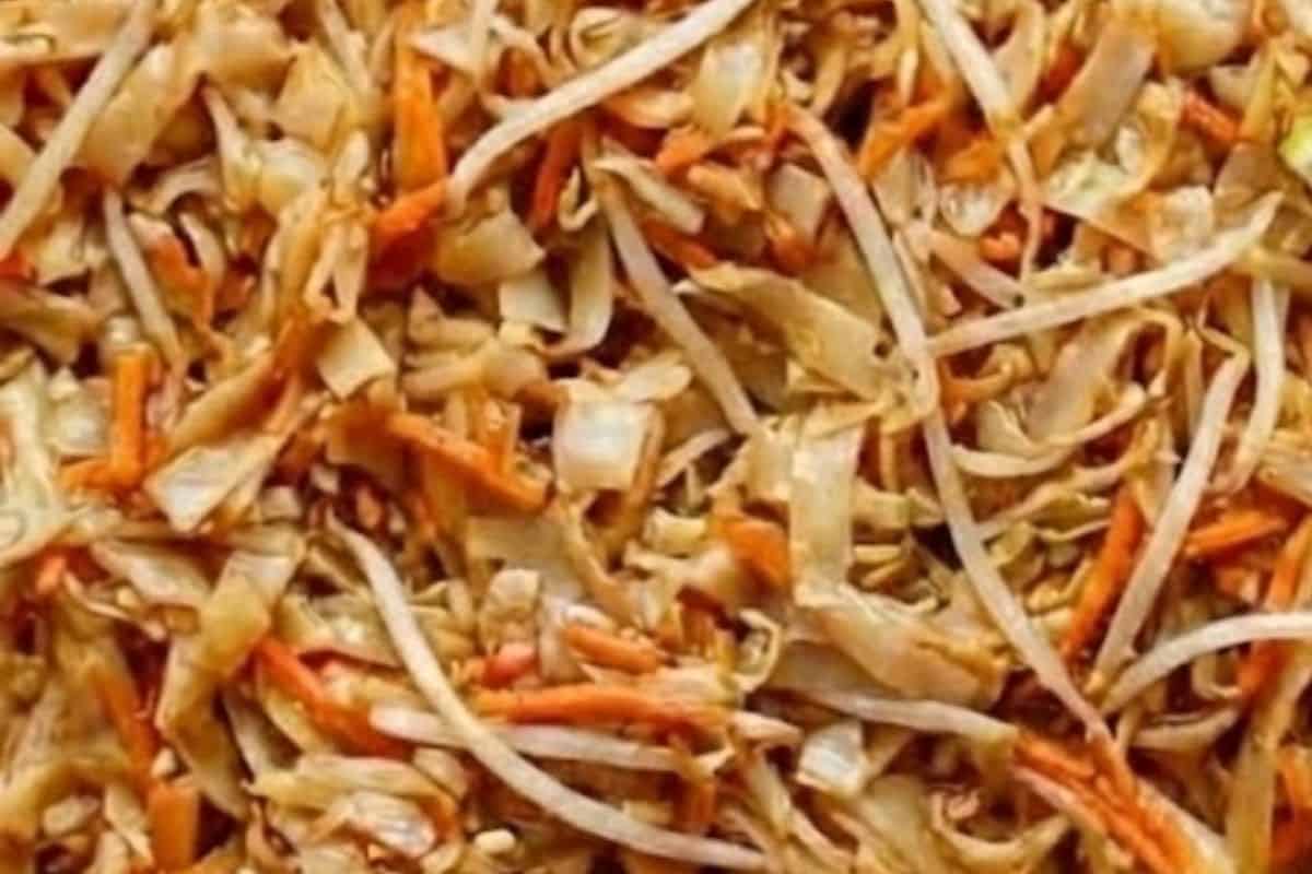 Remove the chicken and keep warm, then drain excess fat from the skillet if needed.Add one cup of the thickened glaze to the pan with the noodles and toss for about a minute, then stir through the bean sprouts and grated carrot until just tender.