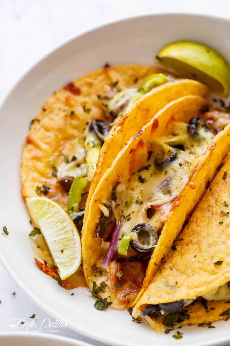 Easy Oven Baked Barbecue Chicken Pizza Tacos are full of pizza flavours, stuffed inside a crispy taco shell, to give you a reliable of both worlds