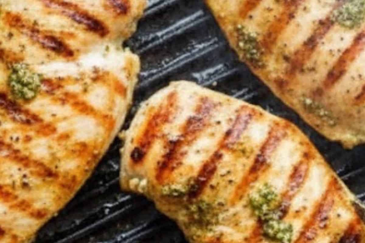 Heat oil in a grill pan over medium-high heat, then cook the chicken on both until golden brown