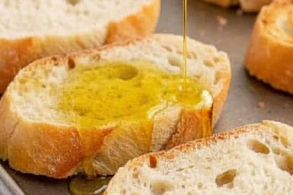 Preheat oven to grill or broil on medium to high heat. Arrange ciabatta on a tray, drizzle with olive oil.