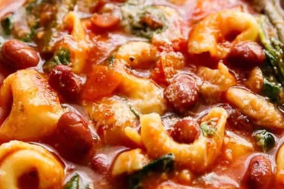 Ladle your Tortellini Minestrone Soup into bowls and top with a sprinkle of parmesan or Romano cheese