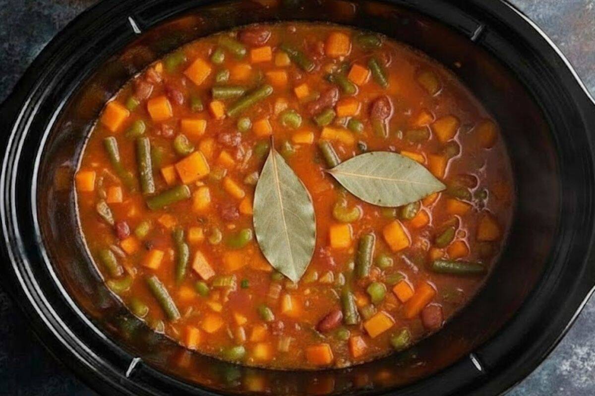 Add all your vegetables and seasoning into your slow cooker.