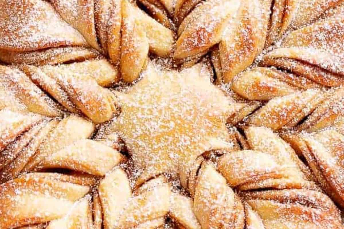 Bake at 350°F or 175°C for about 20 minutes until golden, then dust with powdered sugar and a little cinnamon; serve warm.