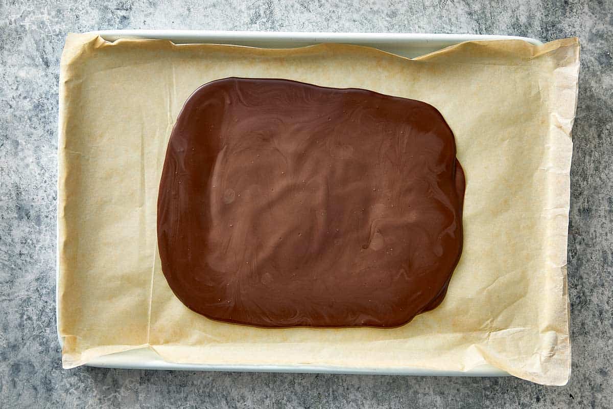 Top overview of frozen chocolate ready to be broken.