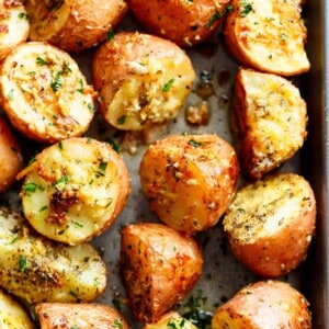 Herbs, garlic, and parmesan cheese are roasted together to make a reliable Crispy Browned Butter Parmesan Roasted Potatoes!