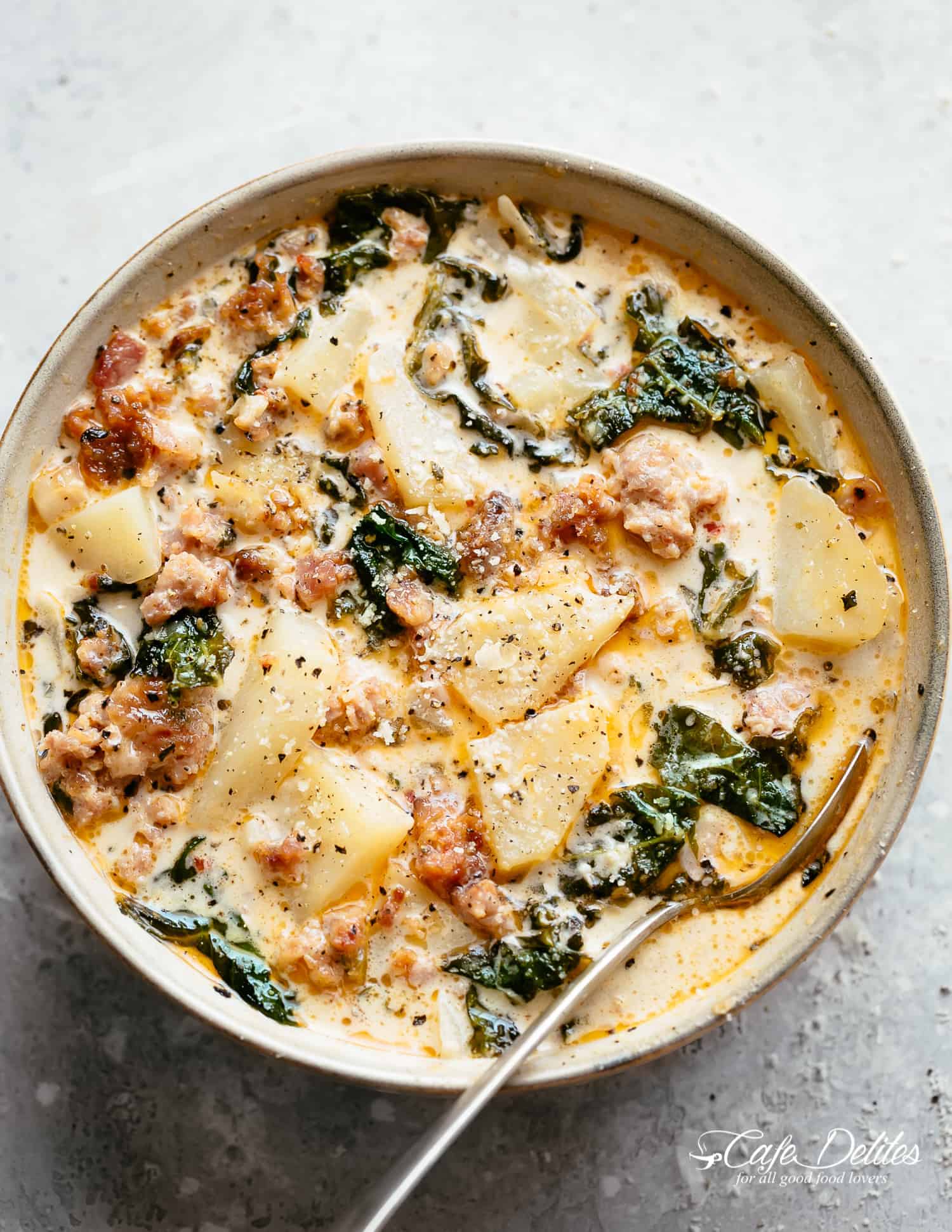 A bowl of Zuppa Toscana with sausage, bacon, kale and potatoes