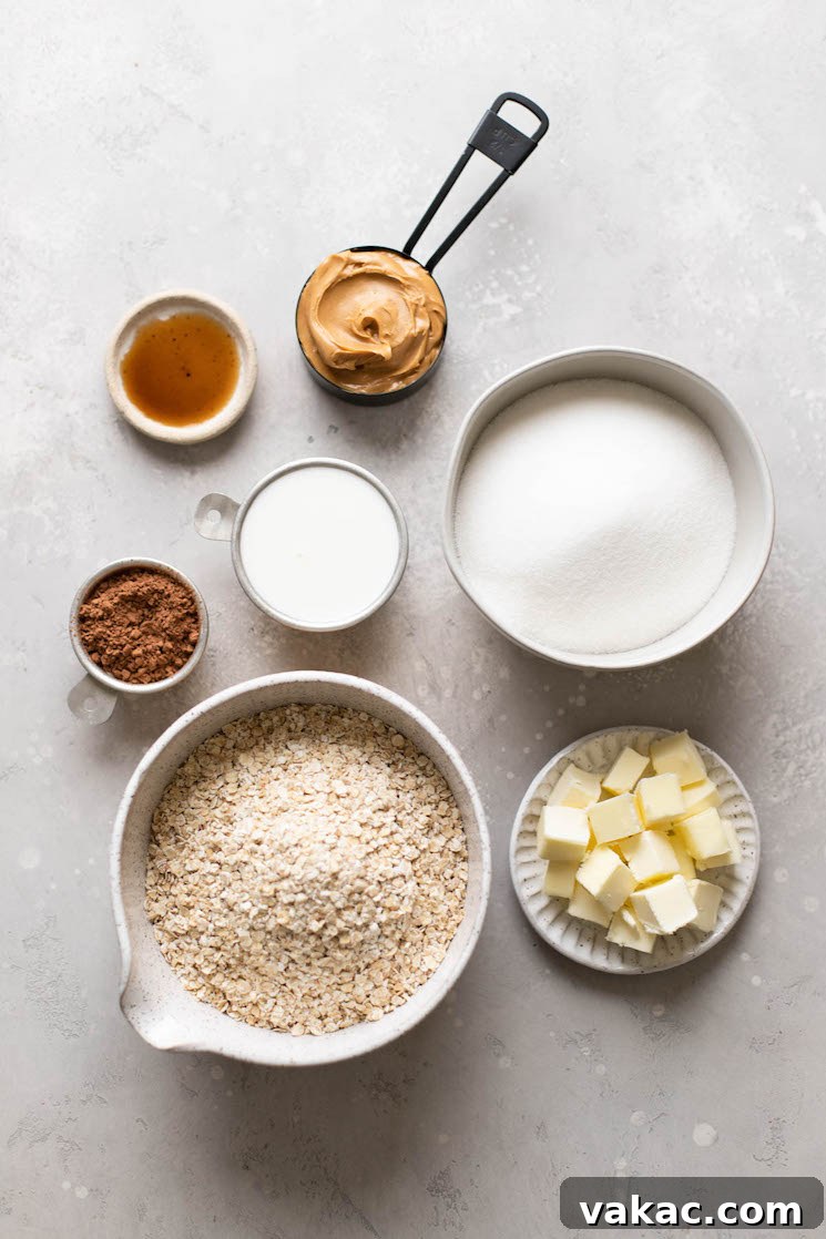 Stovetop Sweetness Made Simple 3 All the essential ingredients for making classic no-bake cookies, neatly presented in various bowls and measuring cups on a clean gray surface, ready for preparation.