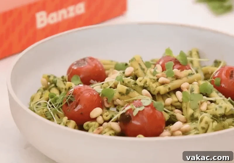 Choosing Your Perfect Pasta: A Noodle Showdown 4 A close-up shot of Banza Miso Pesto Casarecce, highlighting the unique shape and appetizing sauce, suggesting a flavorful and wholesome meal.