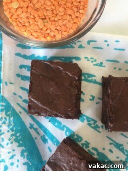 Fudgy Lentil Walnut Brownies 3 A close-up of a perfectly sliced Lentil Walnut Brownie, showcasing its fudgy interior and walnut pieces