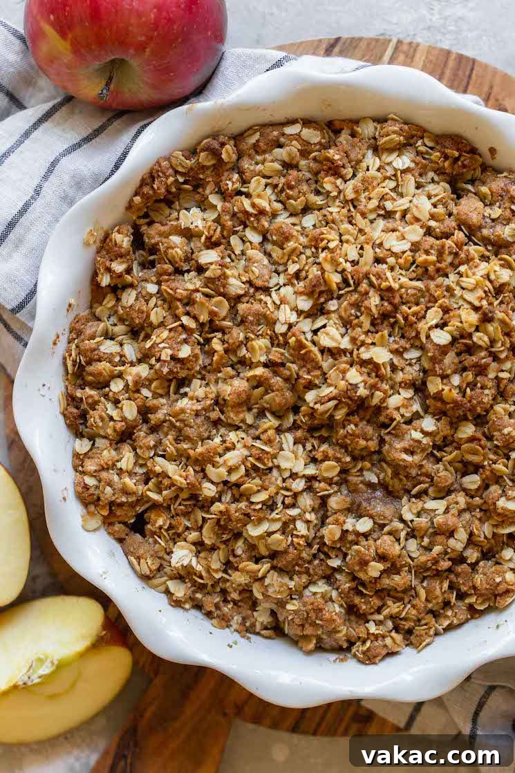 Simply Delicious Apple Crisp 2 A finished apple crisp in a round baking dish.