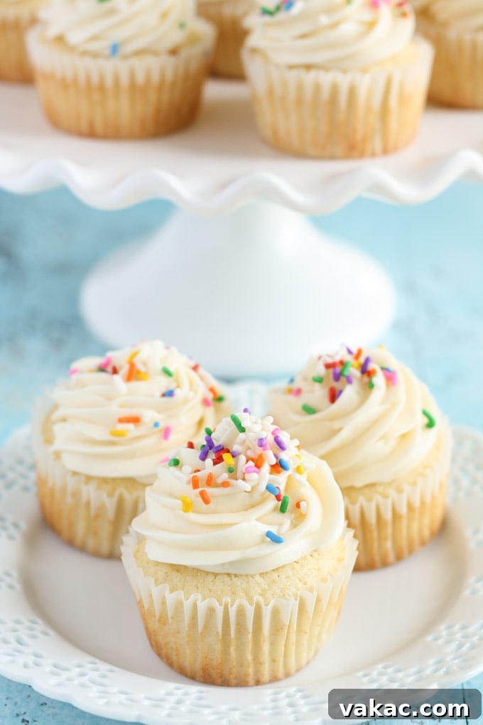 2017's Most Loved Recipes 7 Fluffy Vanilla Cupcakes, a timeless treat for any celebration.