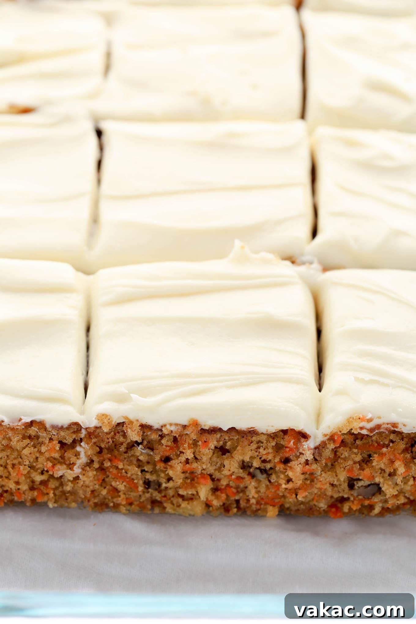 Tropical Carrot Bliss 3 A homemade carrot cake with pineapple, sliced and ready to serve.