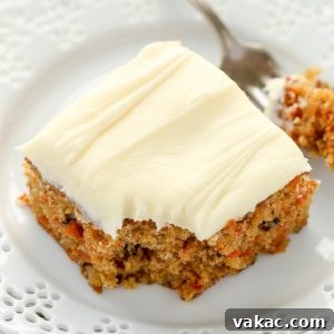 Tropical Carrot Bliss 6 Two slices of pineapple carrot cake on white plates
