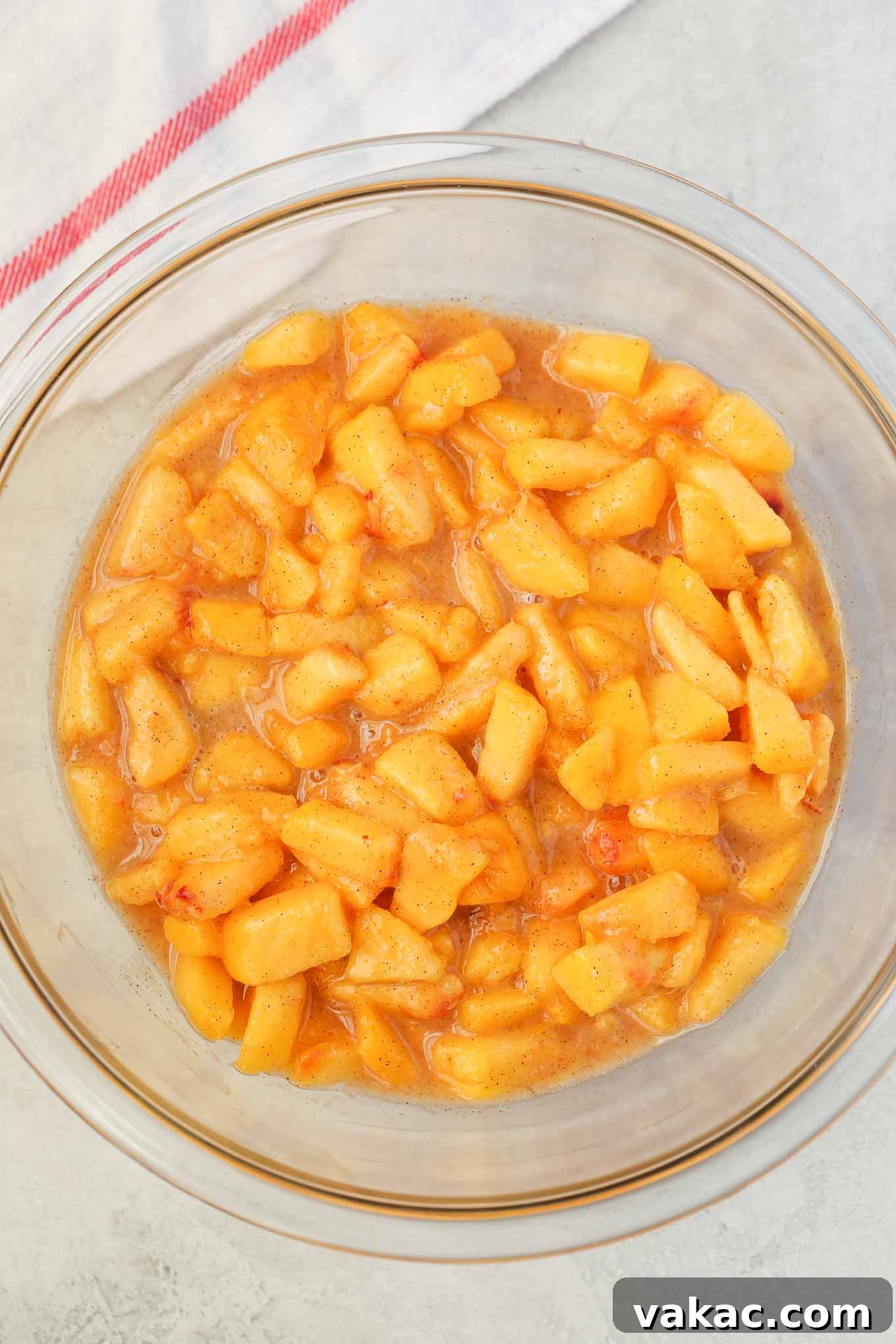 Sun-Kissed Peach Crumble Bars 4 An overhead view of a bowl filled with a fresh, vibrant peach filling, perfectly chopped and ready for baking.