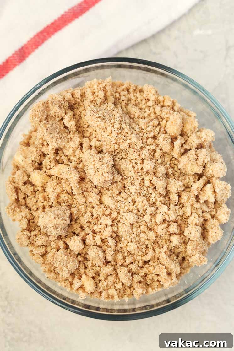 Apple Cinnamon Coffee Cake 3 Overhead view of streusel topping in a glass dish.
