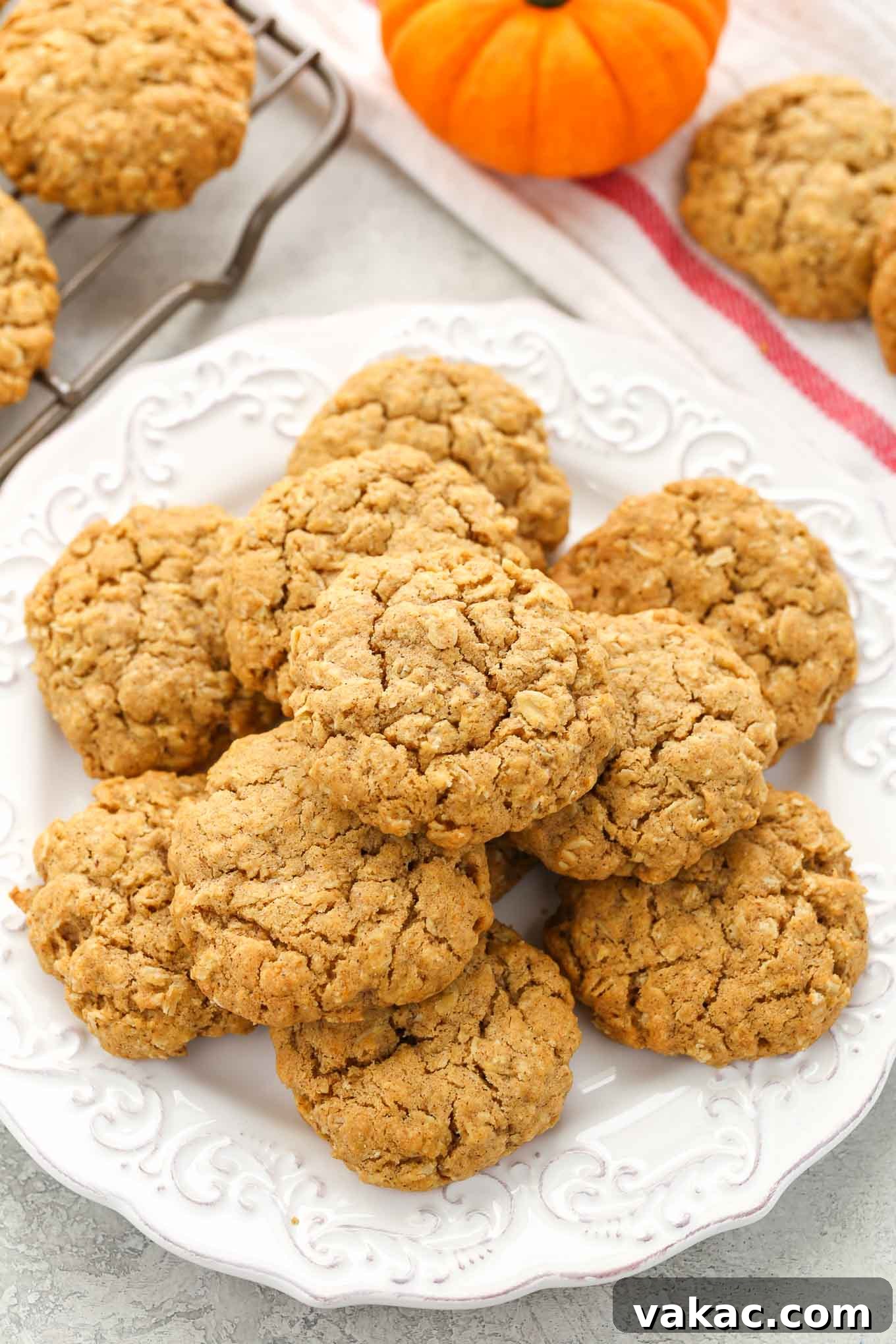 The Ultimate Soft and Chewy Pumpkin Oatmeal Cookies, featuring a thick, inviting texture and rich pumpkin flavor.